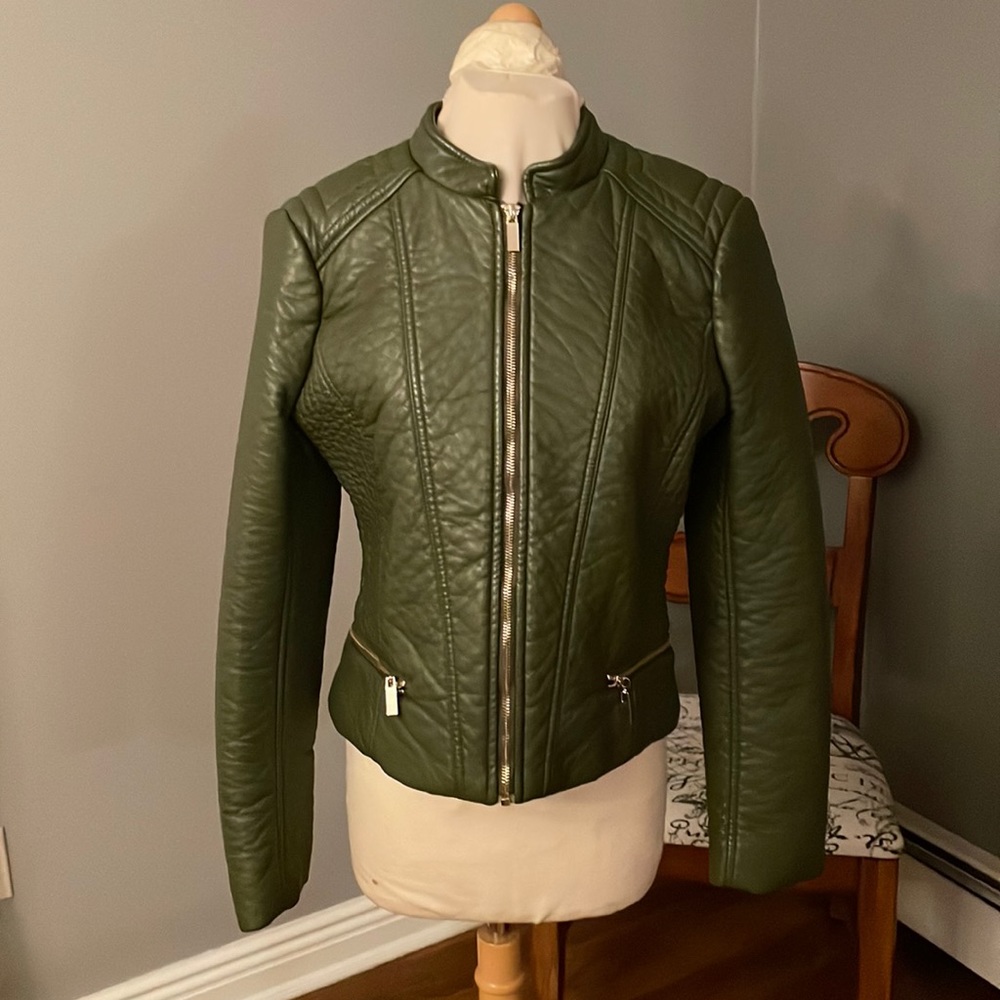 Olive green faux leather jacket great condition two pockets.
